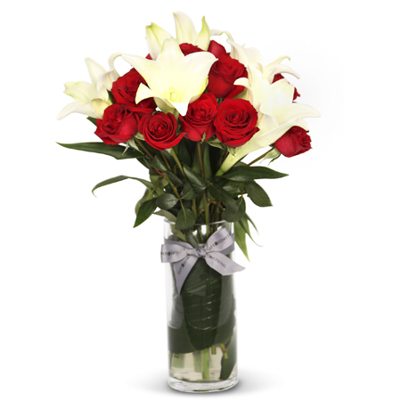 Florero de rosas y liliums